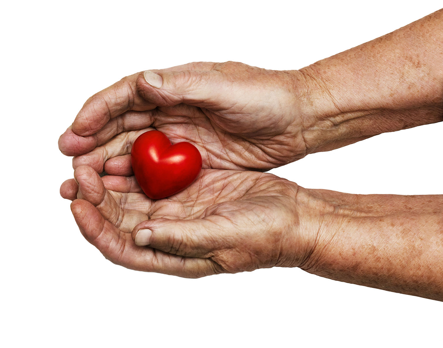 2 hænder der holder et rødt hjerte